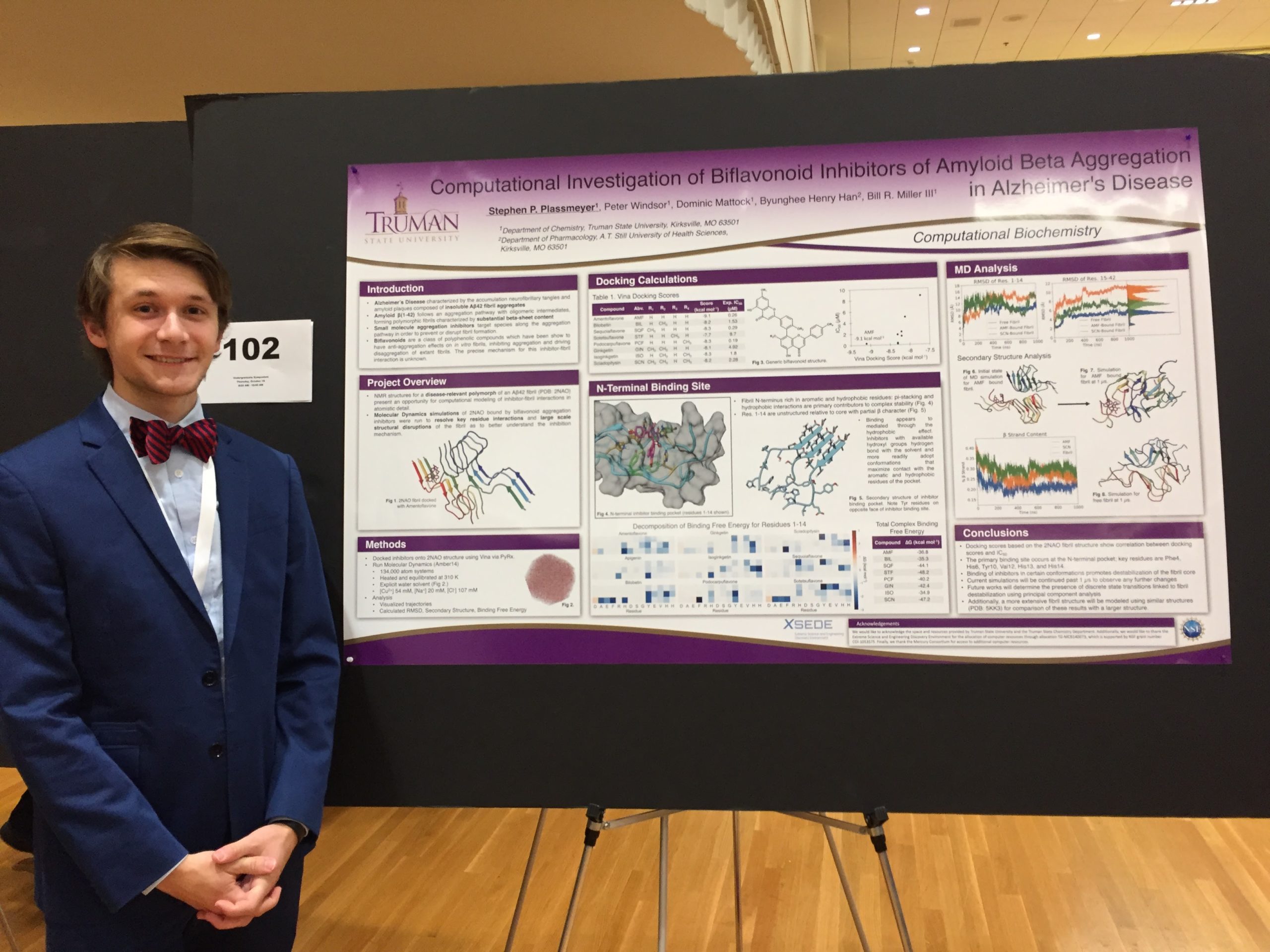 Stephen in front of his research poster