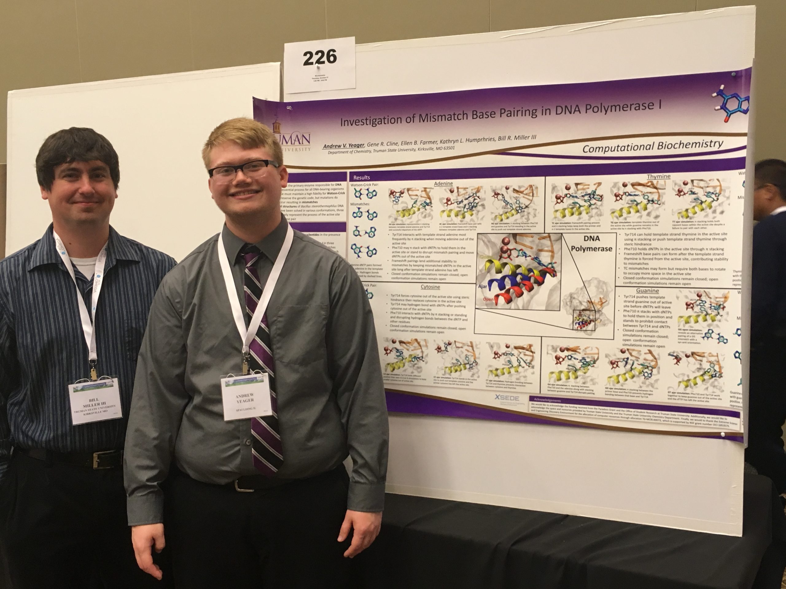 Dr. Miller with Andy Yeager and his DNA polymerase poster