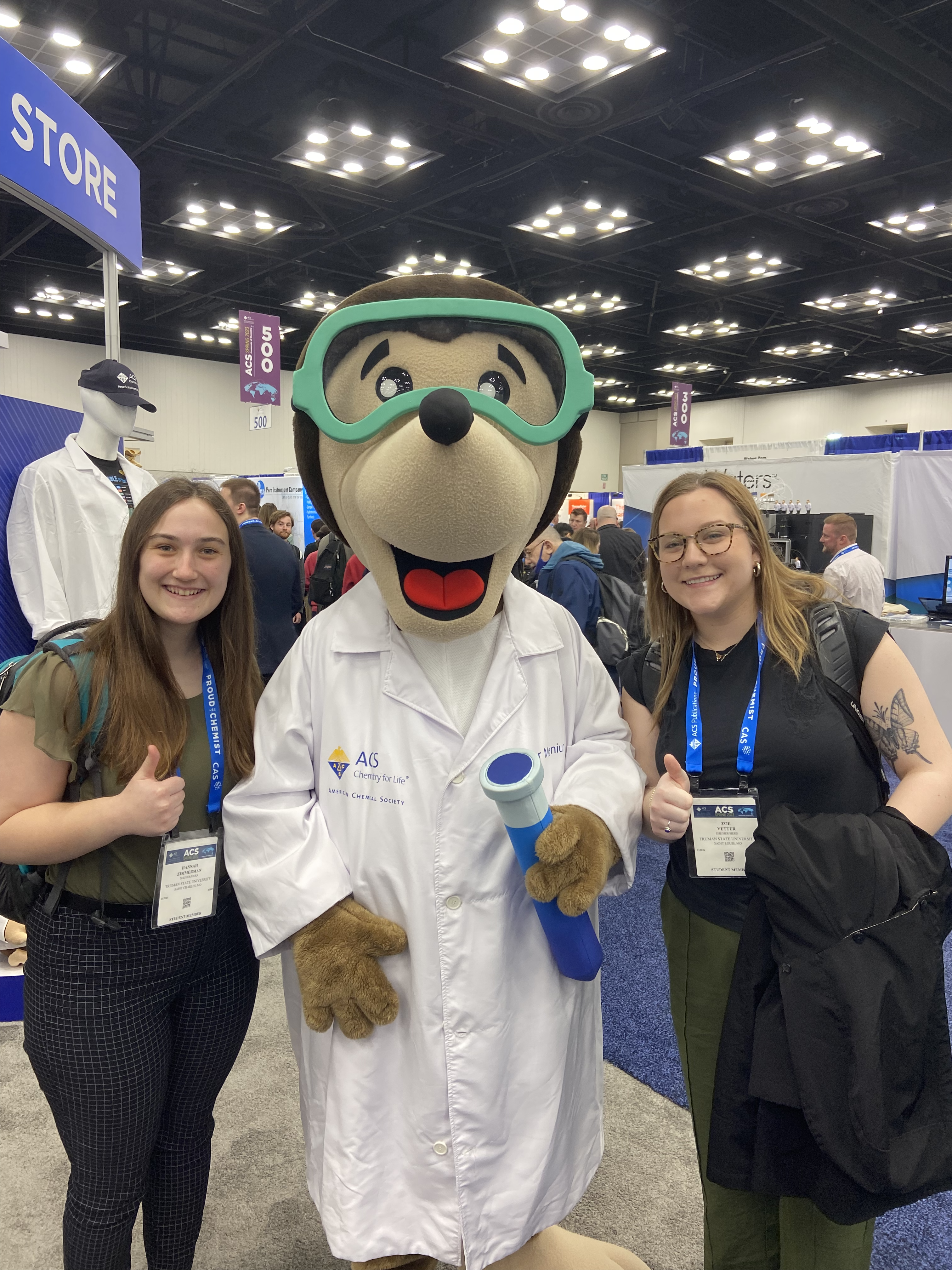 Hannah (left) and Zoe (right) posing with the ACS mole (middle). If you look carefully, you can see Dominic photo bombing just over the right shoulder of the mole.